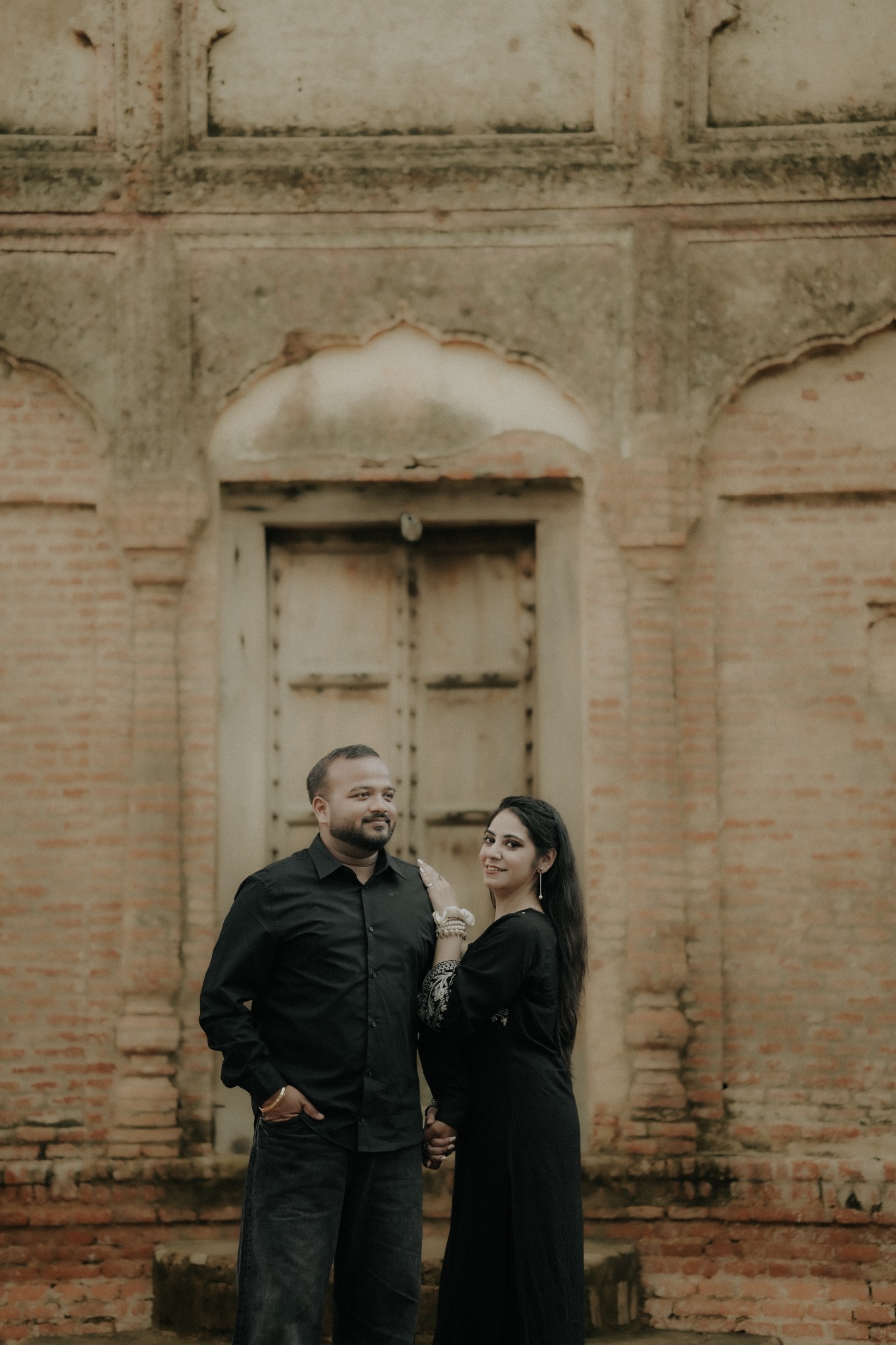 Couple portrait in black at a heritage location